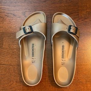 Birkenstocks single strap rubber sandal